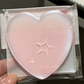 Transparent pearlescent sticky notes in the shape of a heart